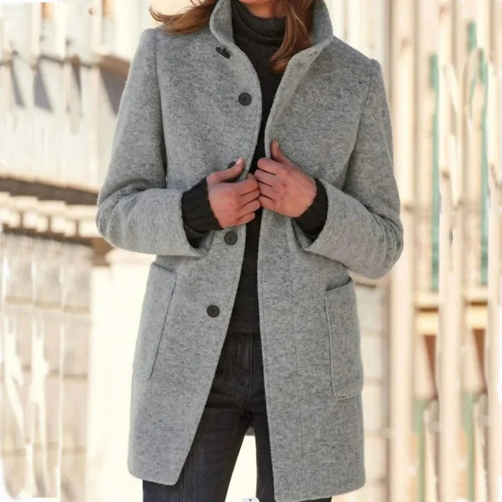 Rosalind stand collar button front midi coat in light gray, front view