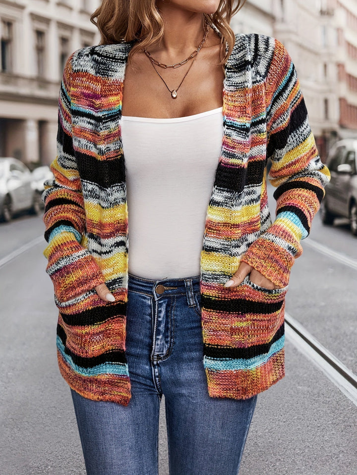 Rosalind striped cardigan with hands in pockets, close-up front view