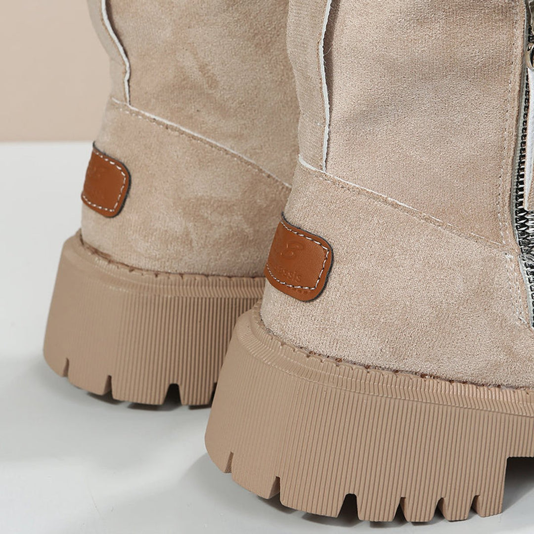 Rosalyn ankle boots back view showing heel tab and lugged sole