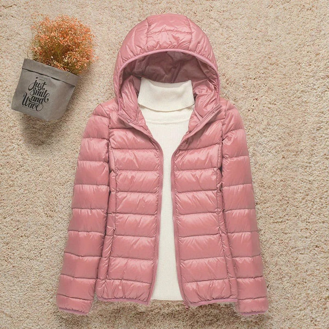 Sabina hooded packable puffer jacket in pink, front view unzipped