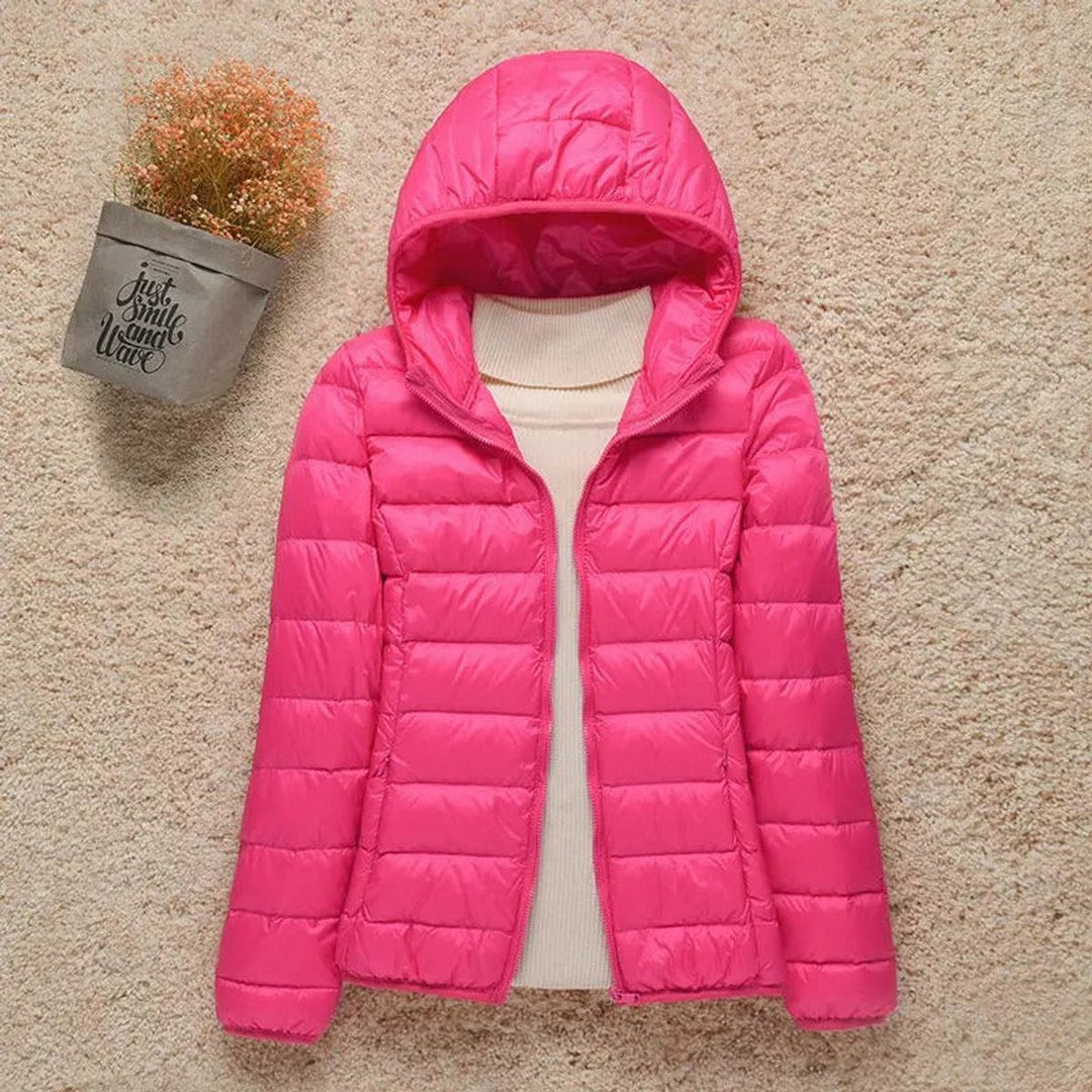 Sabina hooded packable puffer jacket in fuchsia, front view with hood up
