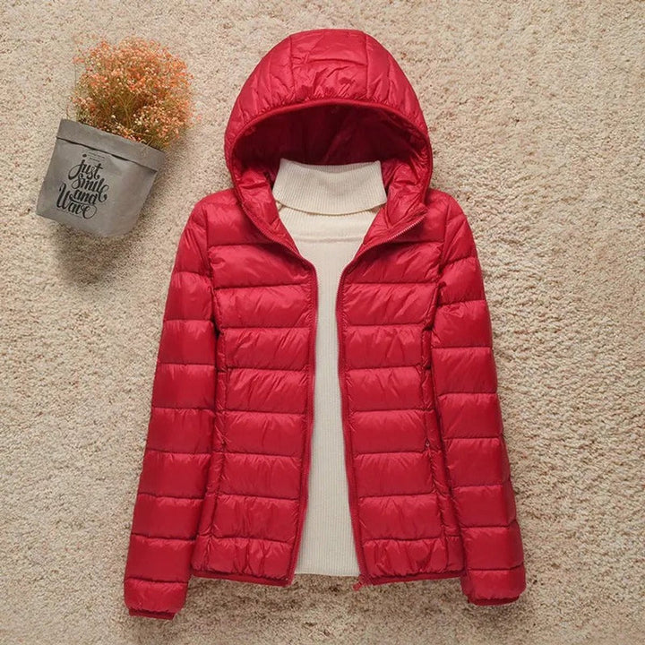 Sabina hooded packable puffer jacket in red, front view unzipped
