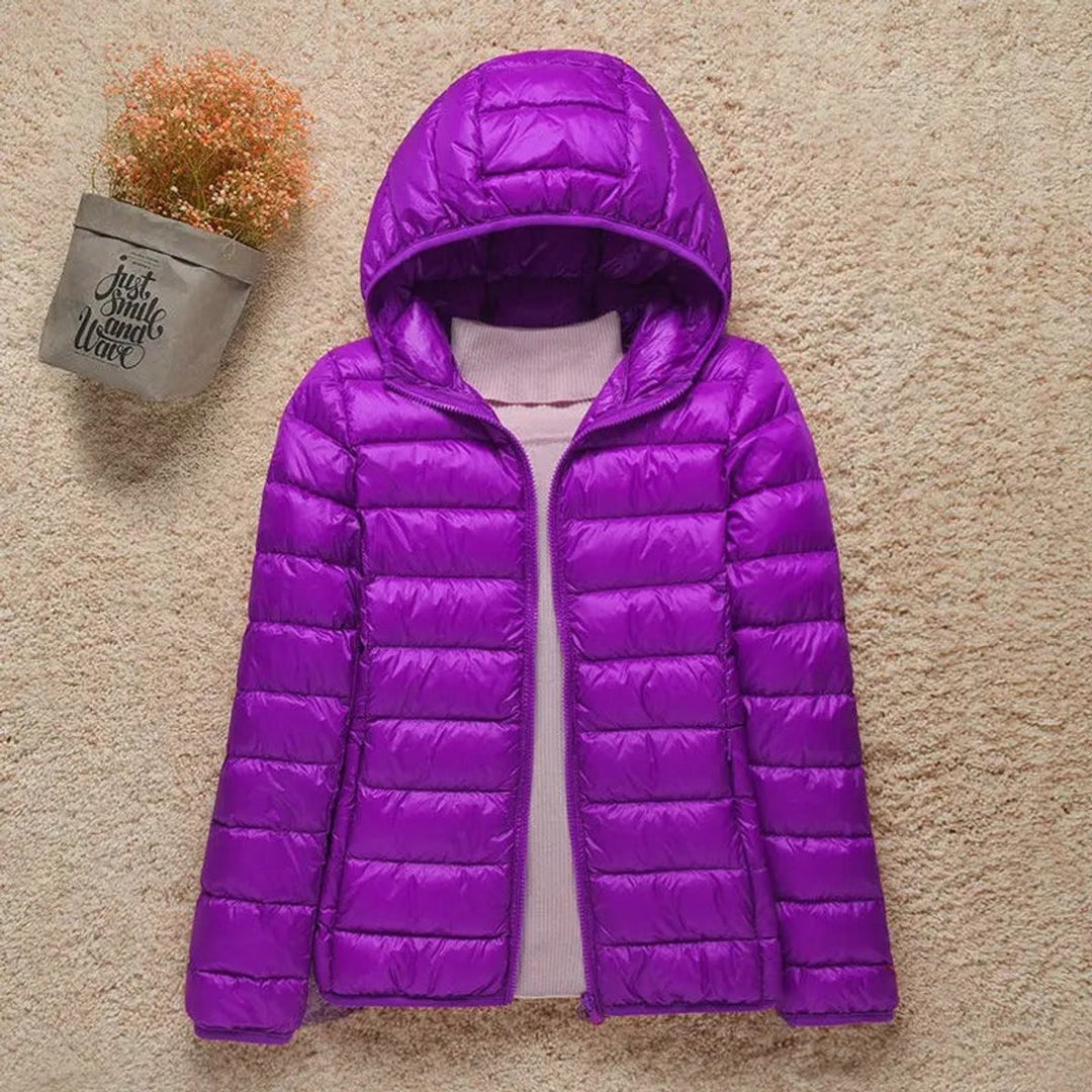 Sabina hooded packable puffer jacket in lilac, front view unzipped