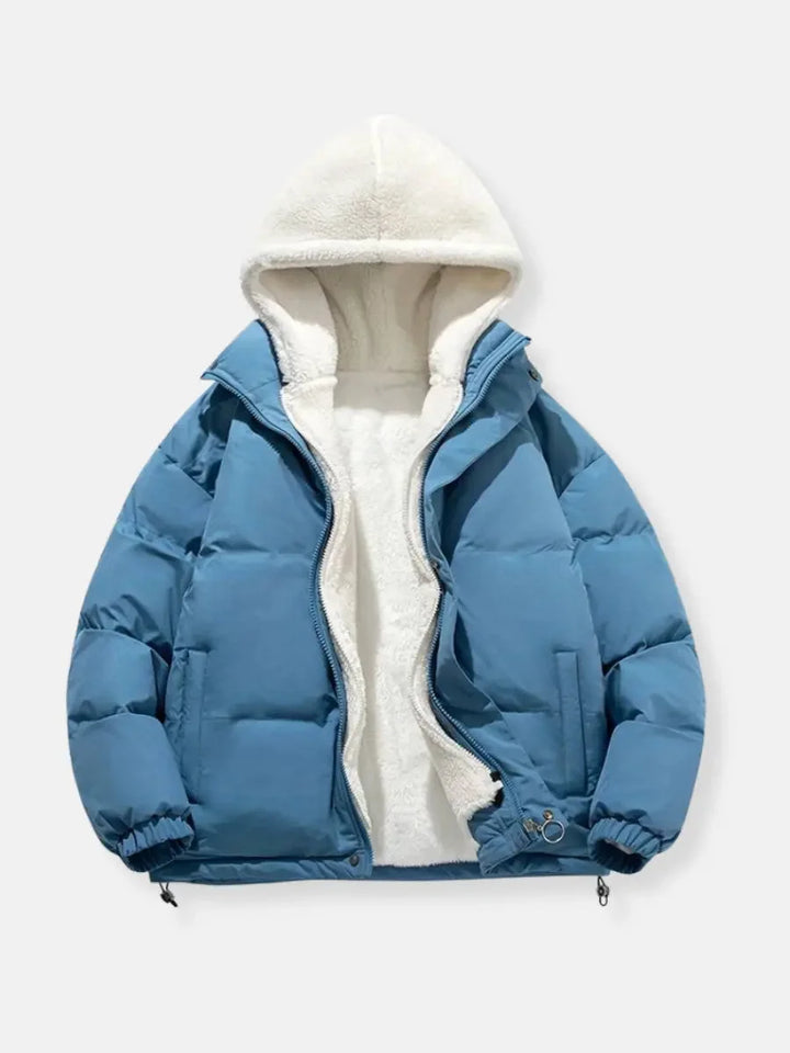 Sabine hooded puffer jacket in blue, front view open with fleece lining visible