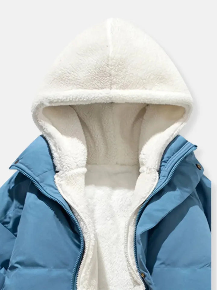 Close-up of blue puffer jacket fleece-lined hood