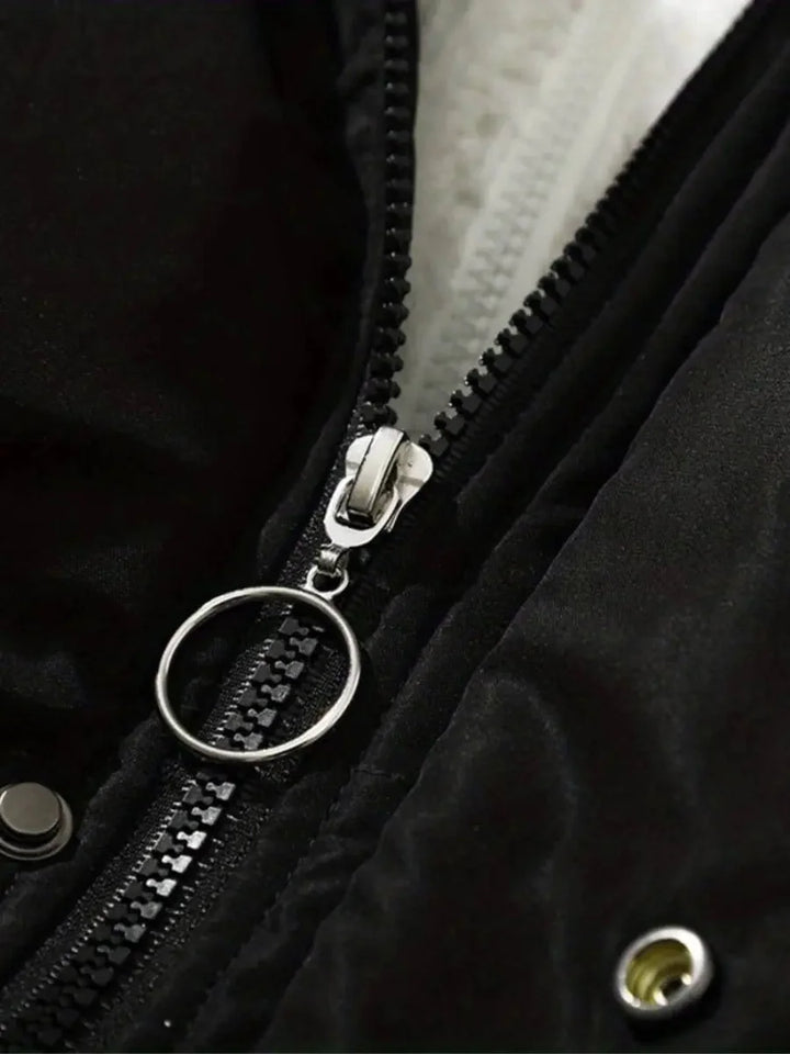 Close-up of silver ring-pull zipper detail on Sabine puffer jacket