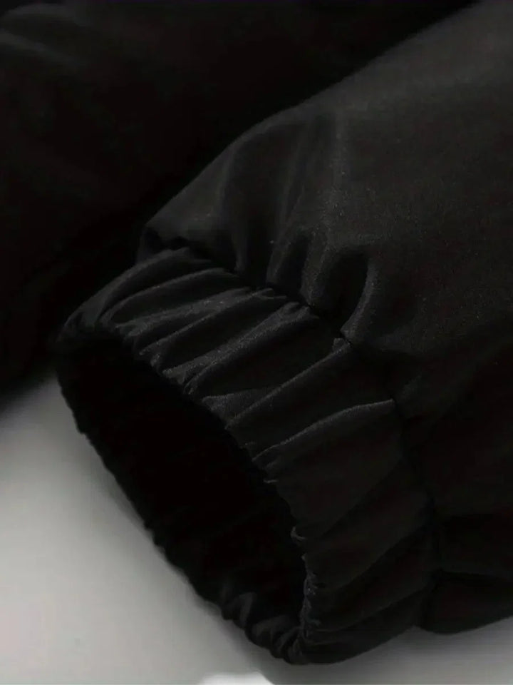 Close-up of elastic drawstring cuff on Sabine puffer jacket