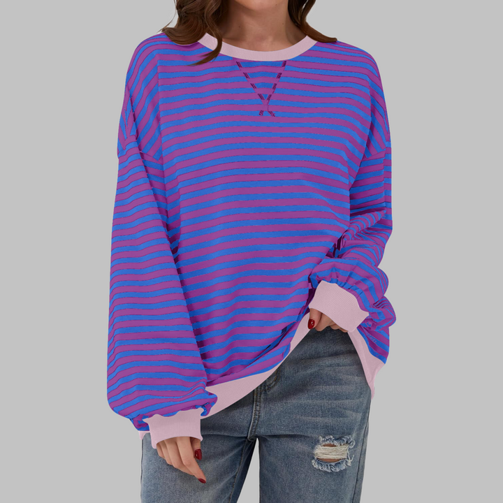 Sabine purple and blue striped sweatshirt with pink contrast trim, front view