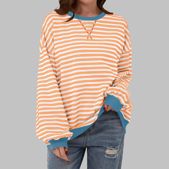 Sabine orange and white striped sweatshirt with blue contrast trim, front view