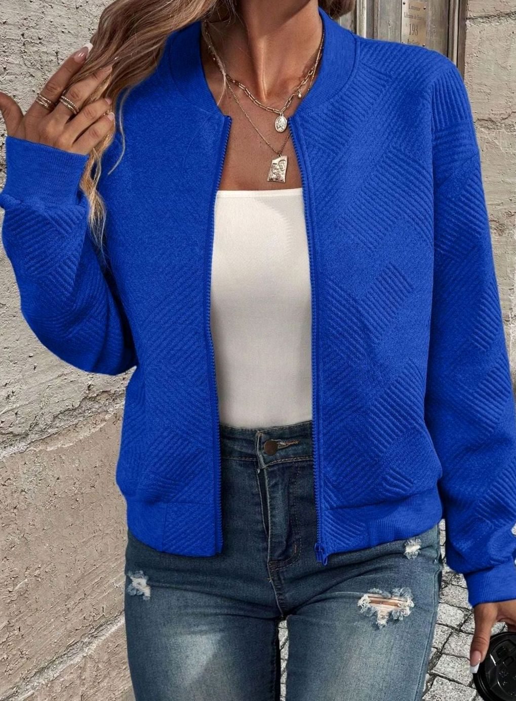 Sabine blue textured knit zip-up bomber jacket, front view close-up