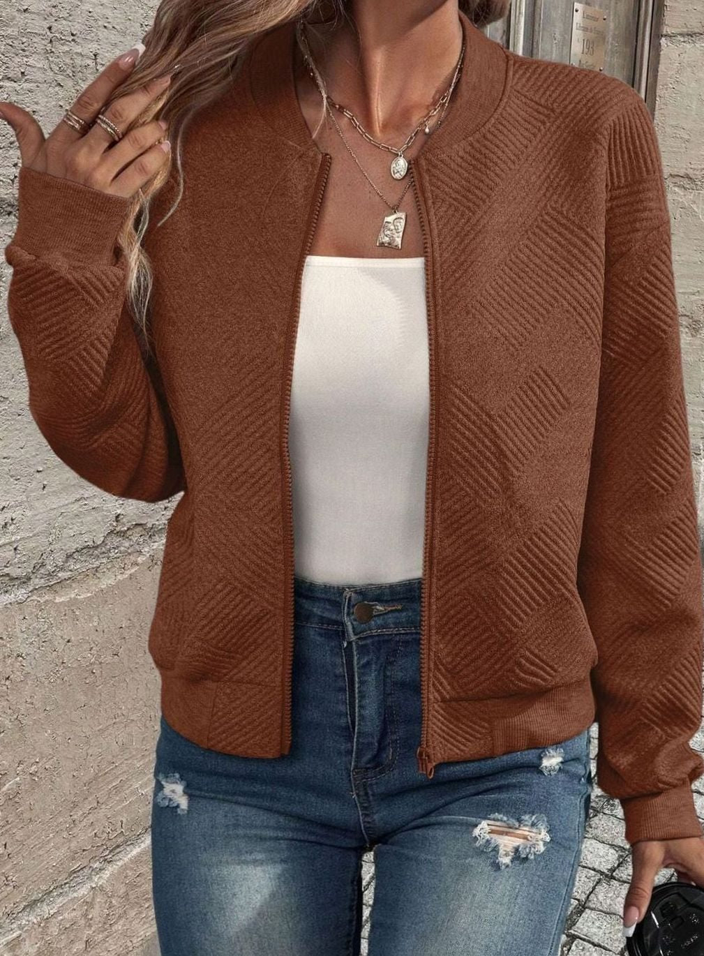 Sabine white textured knit zip-up bomber jacket, side view close-up
