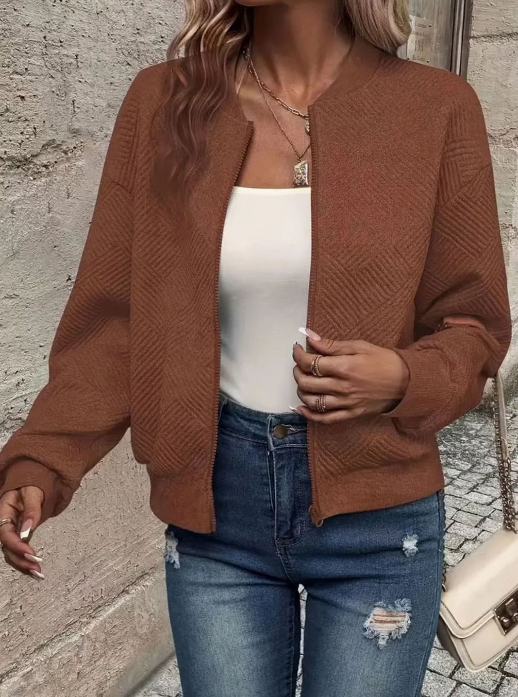 Sabine white textured knit zip-up bomber jacket, side view close-up