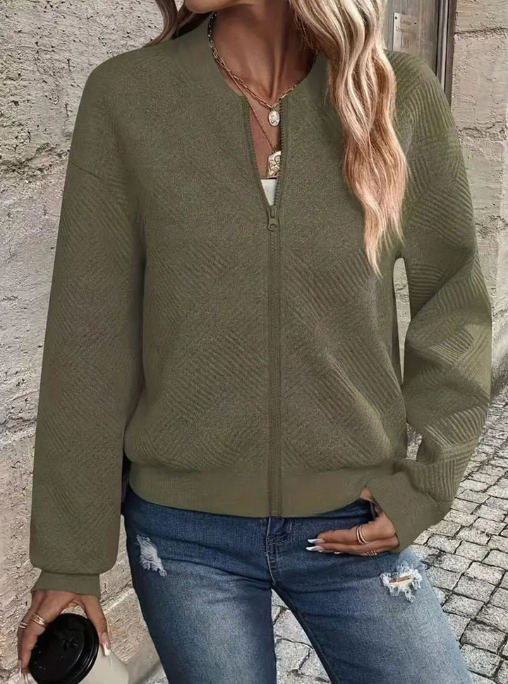 Sabine white textured knit zip-up bomber jacket, side view close-up