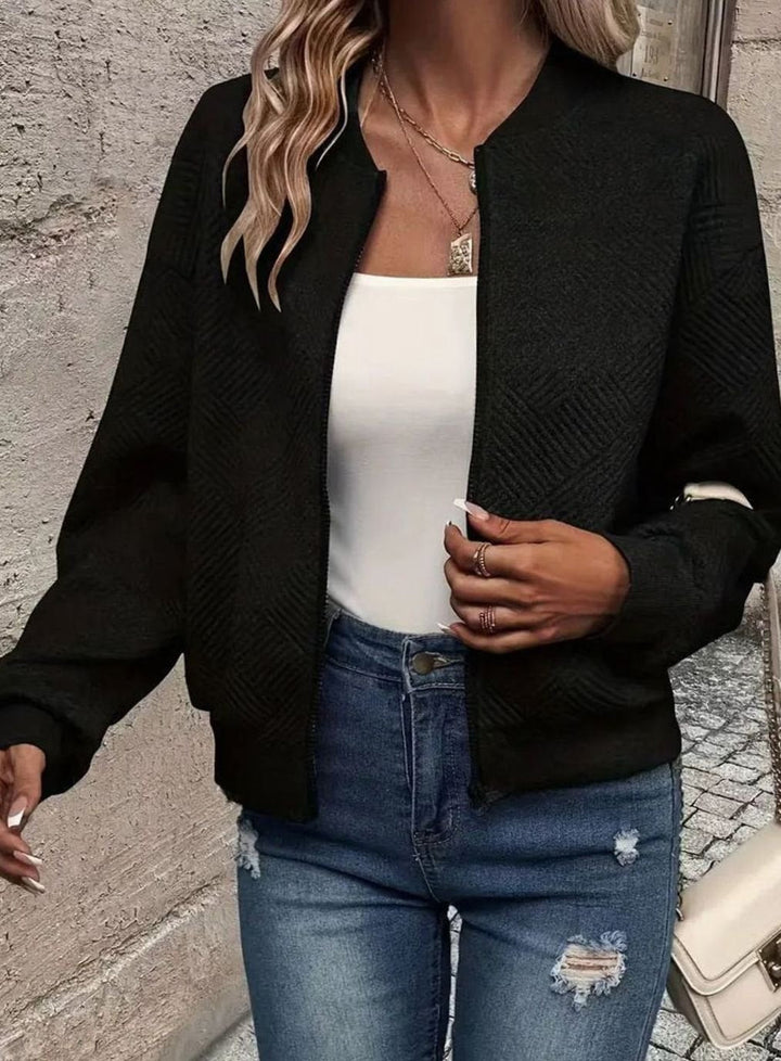 Sabine white textured knit zip-up bomber jacket, side view close-up