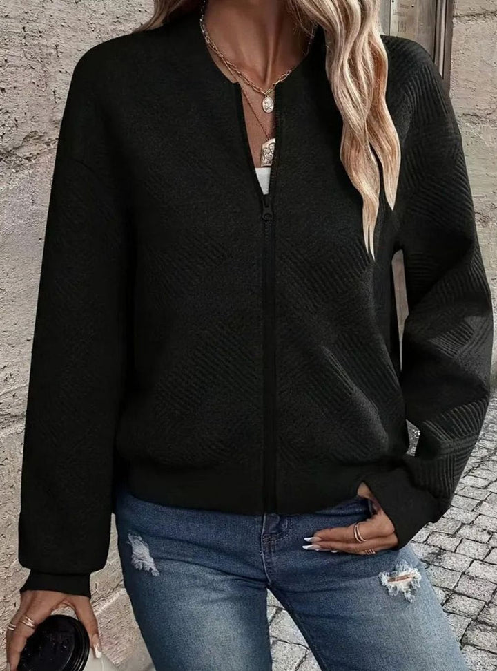 Sabine white textured knit zip-up bomber jacket, side view close-up