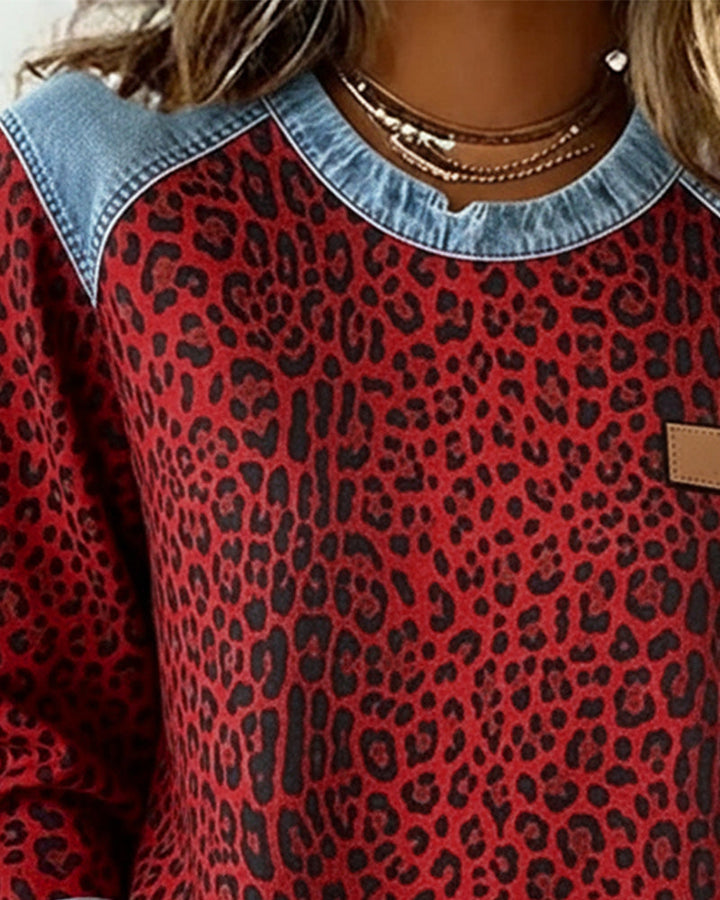 Seraphine red leopard print sweatshirt, close-up neckline detail