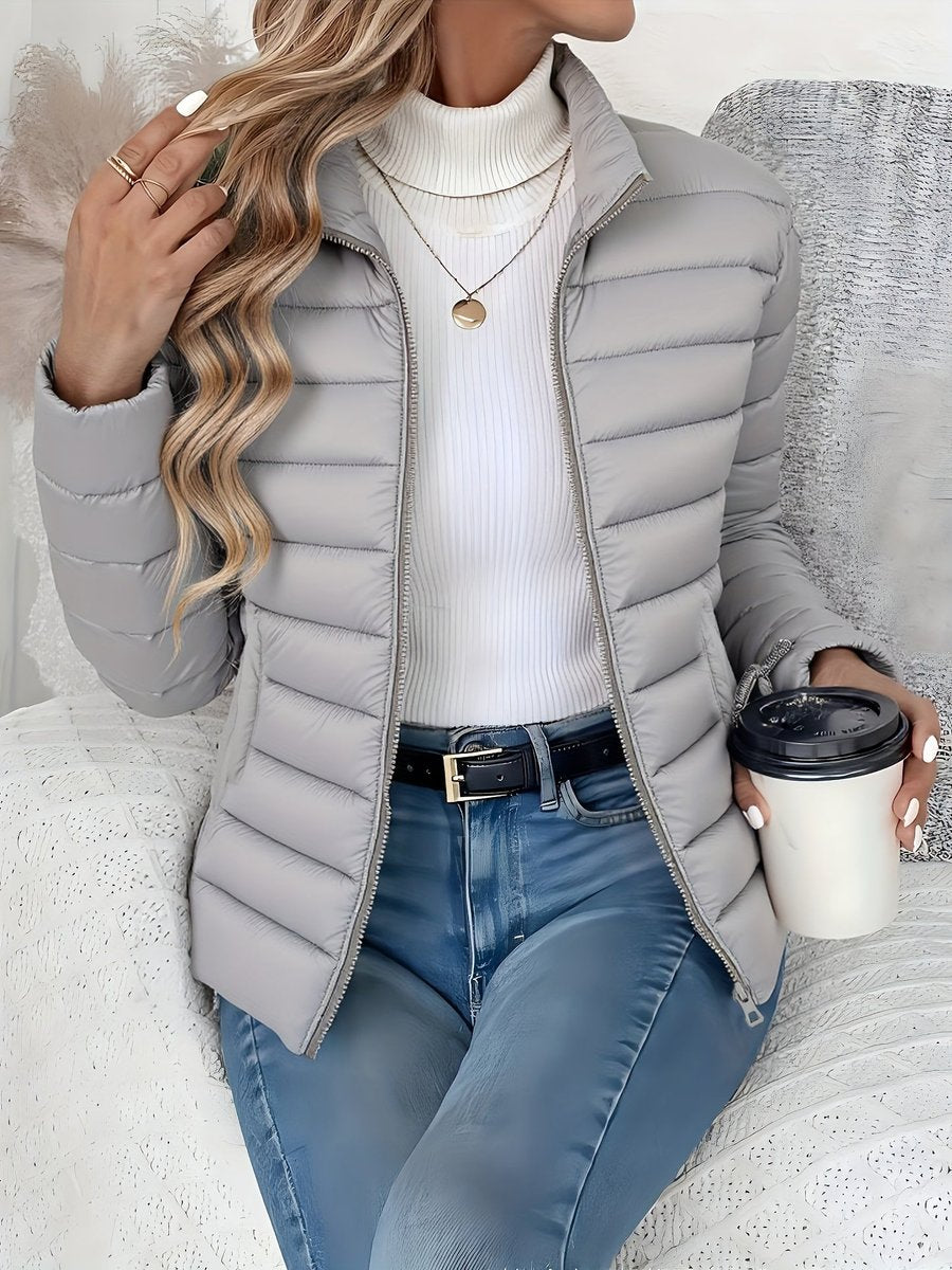 Sienna gray quilted puffer jacket, front view seated