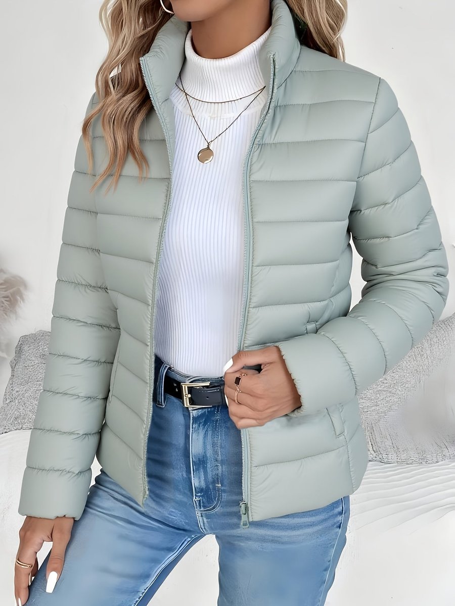 Sienna sage green quilted puffer jacket, close-up front view