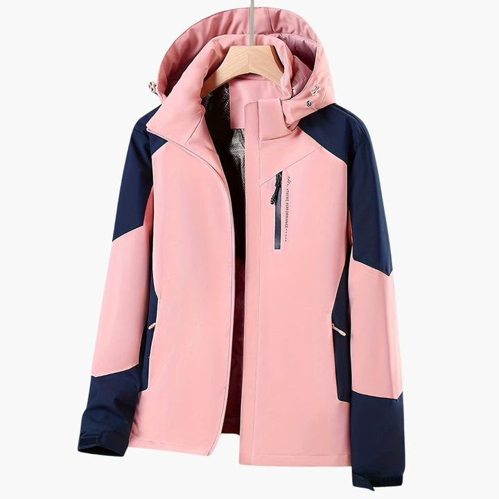 Sylvie pink and navy color block hooded jacket, front view on hanger