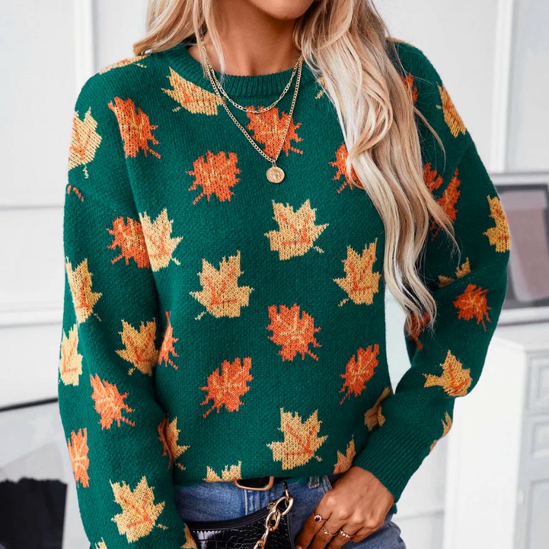 Sylvie leaf print crew neck sweater, front view close-up with layered necklace