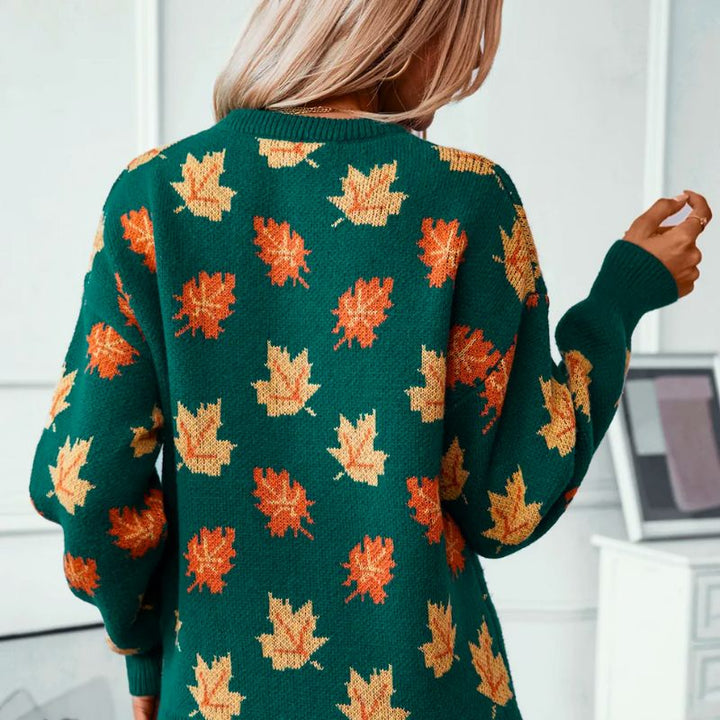 Sylvie leaf print crew neck sweater, back view showing ribbed cuffs