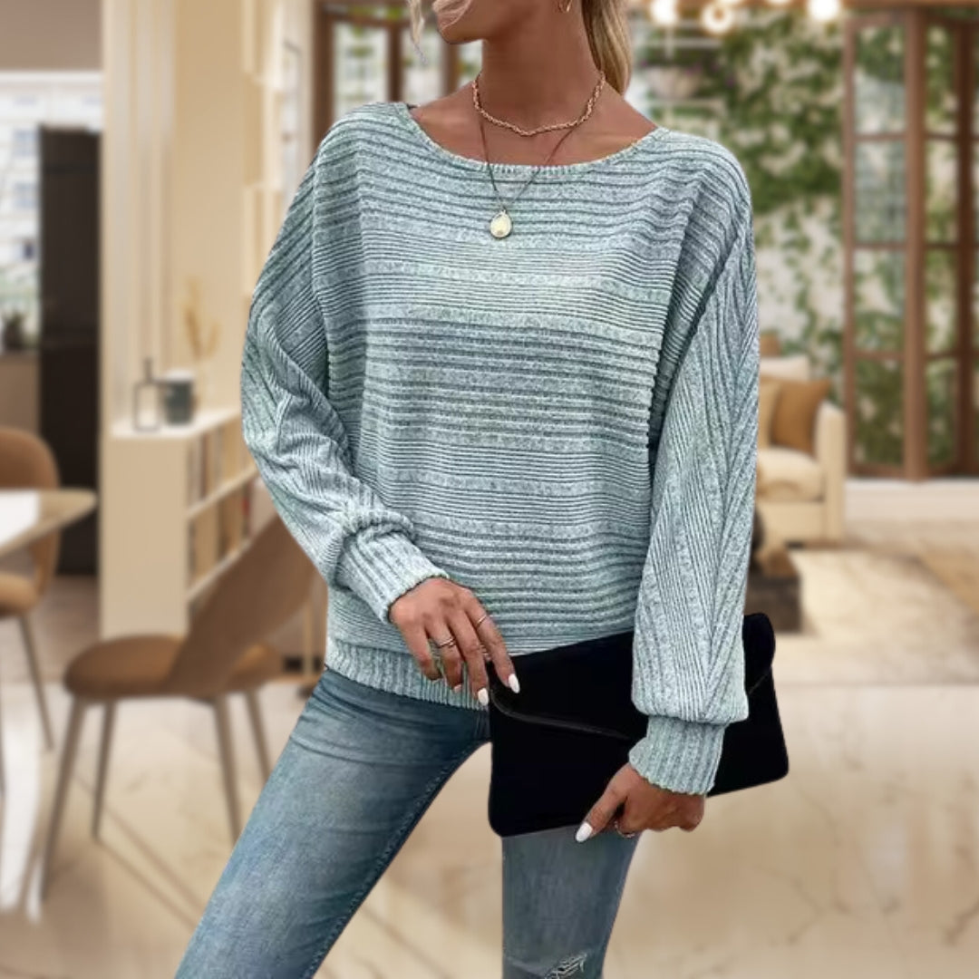 Sylvie ribbed batwing sleeve sweater in light green, front view with pendant necklace