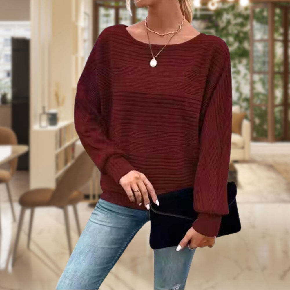 Sylvie ribbed batwing sleeve sweater in burgundy, front view styled with jeans