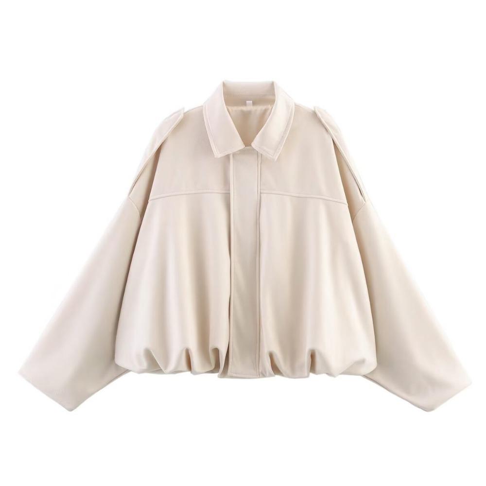 Woman wearing Talia oversized bomber jacket, close-up front detail