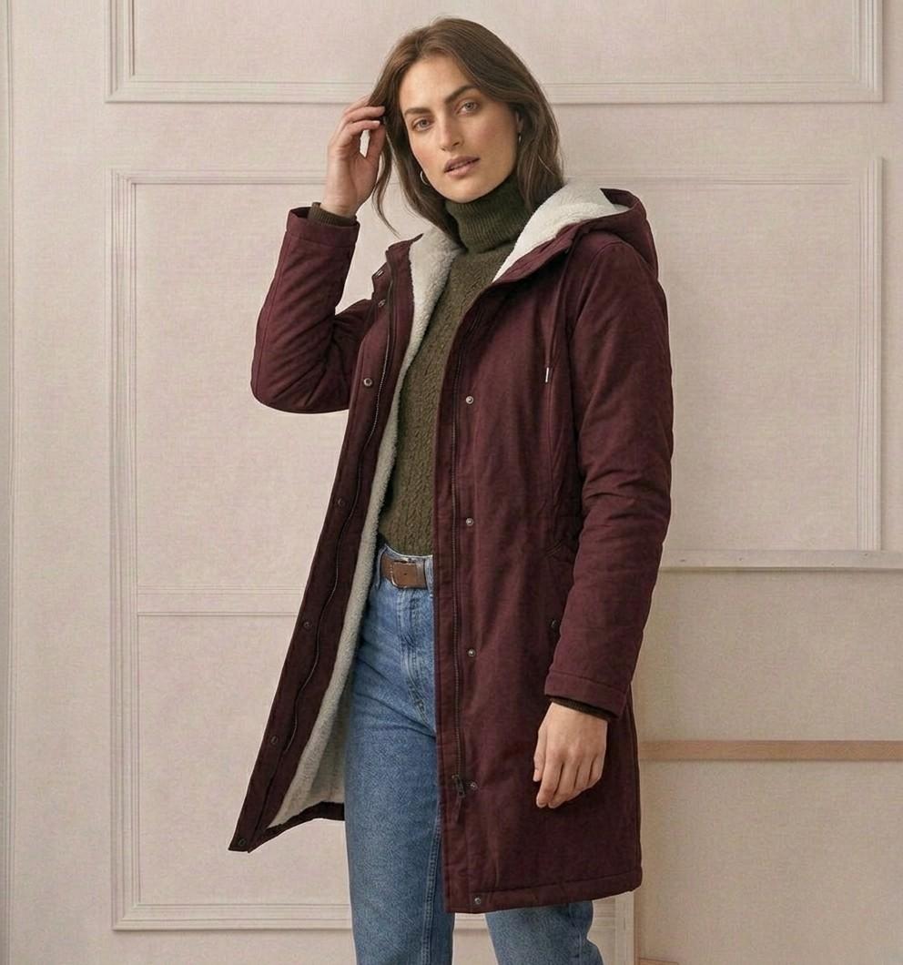 Théodora hooded fleece-lined parka in burgundy, front view on hanger