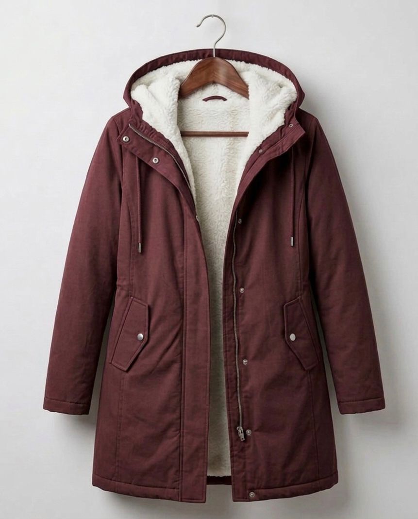 Théodora hooded fleece-lined parka in burgundy, front view on hanger