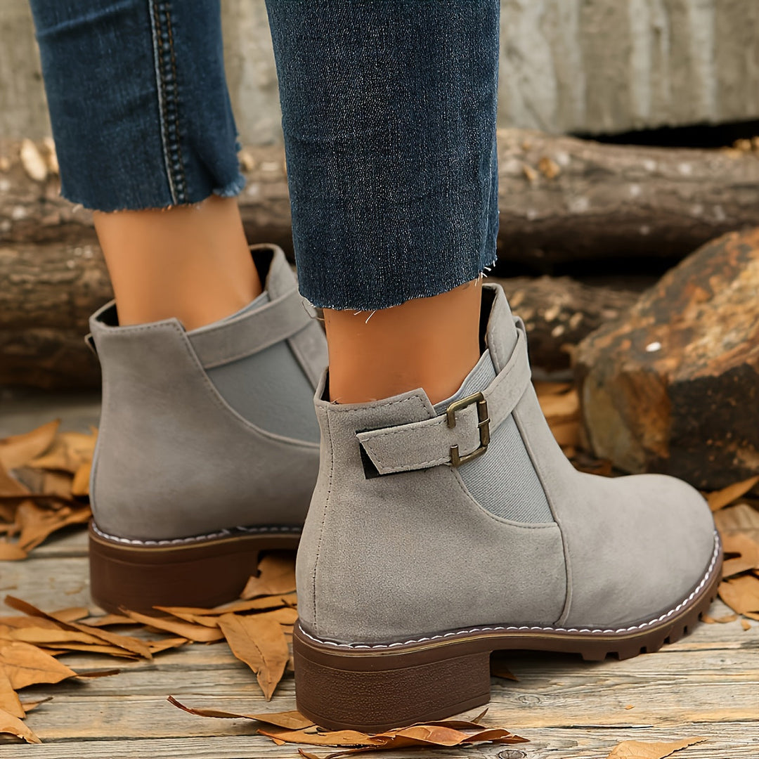Taupe Vivienne Chelsea boots worn on model, top view close-up