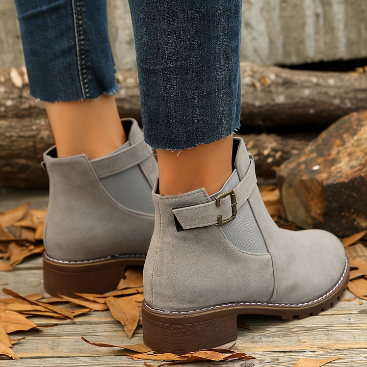Taupe Vivienne Chelsea boots worn on model, top view close-up