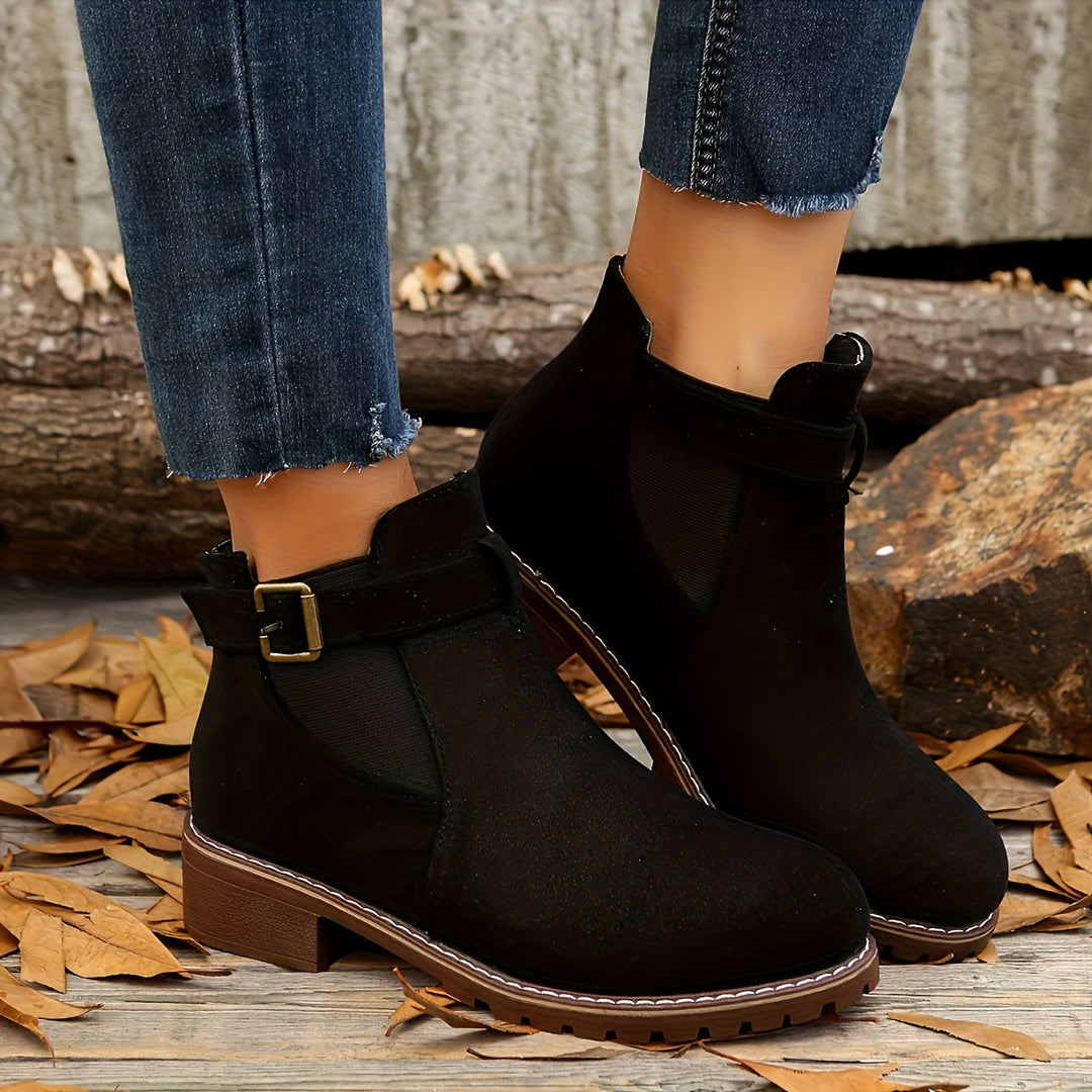 Black Vivienne Chelsea boots worn on model with jeans