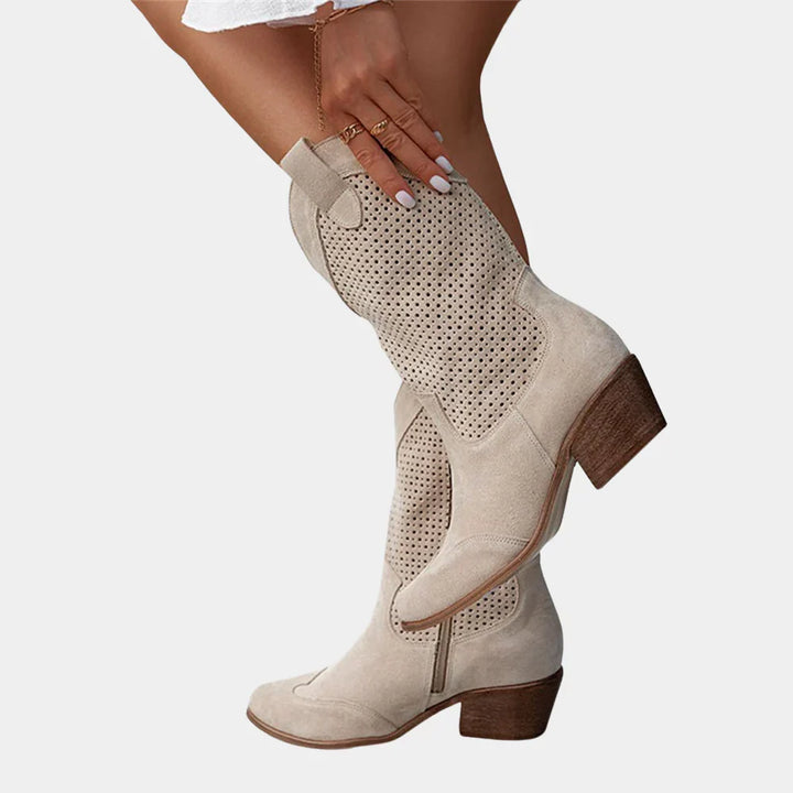 Wilhelmina perforated cowboy boots in beige, back view on model
