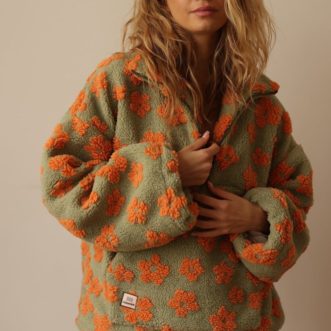 Willa orange floral fleece pullover, close-up front detail