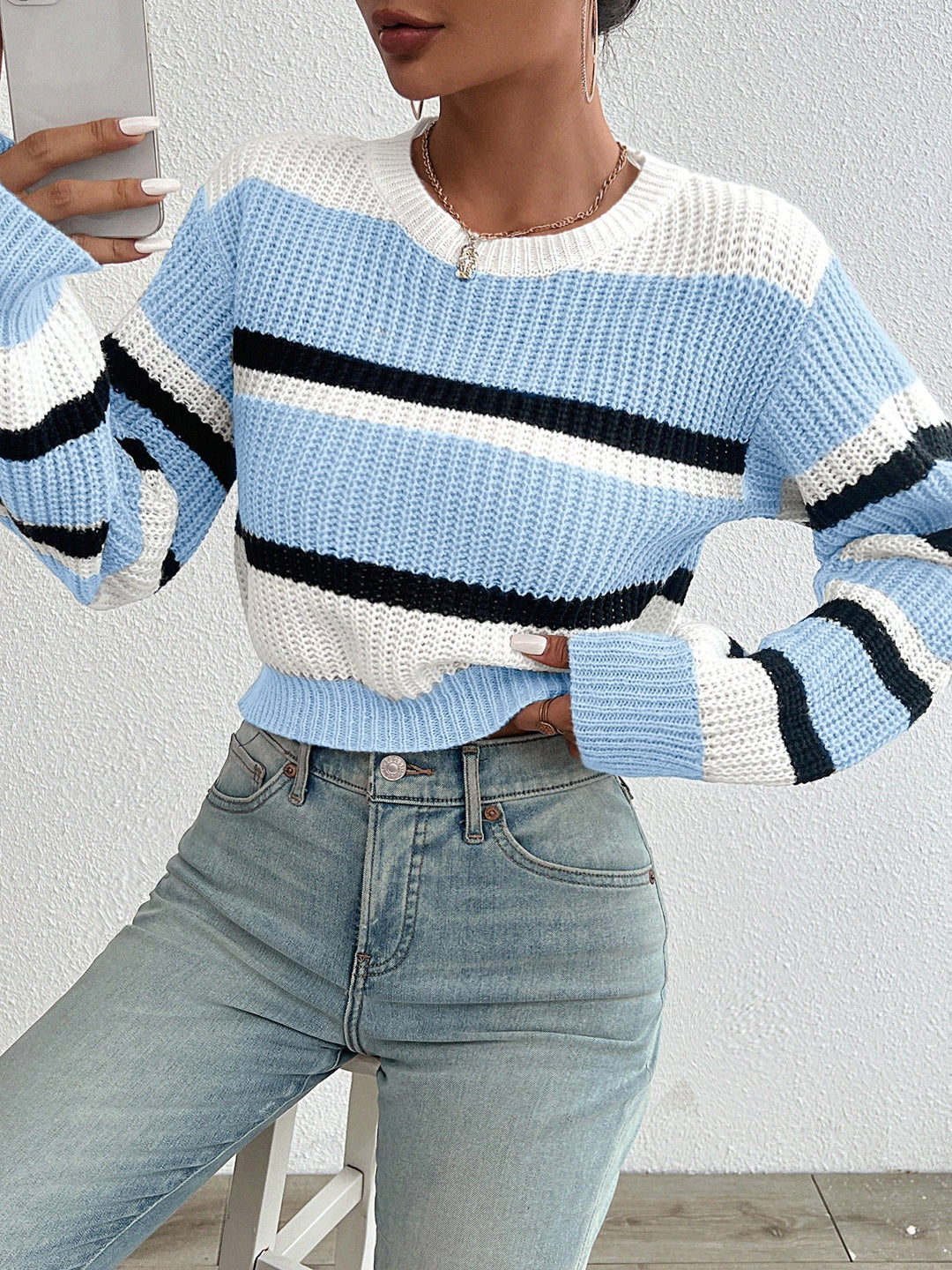 Willow blue striped crew neck sweater, front view