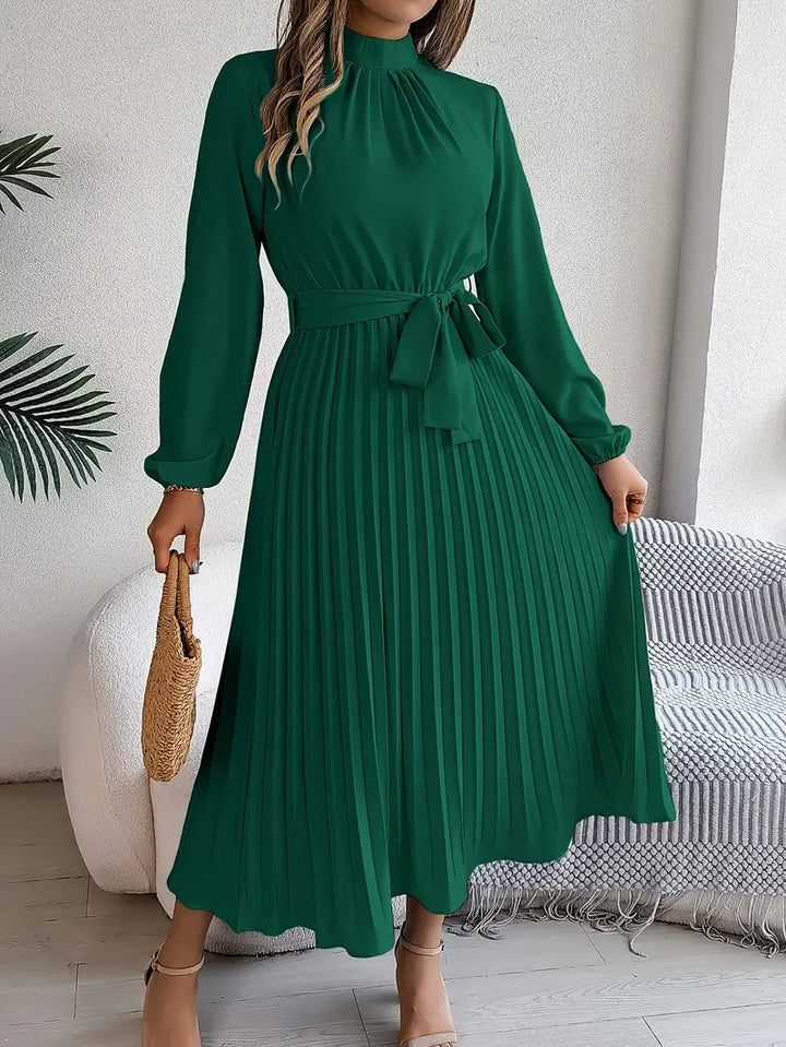 Winifred long sleeve pleated midi dress in green, front view