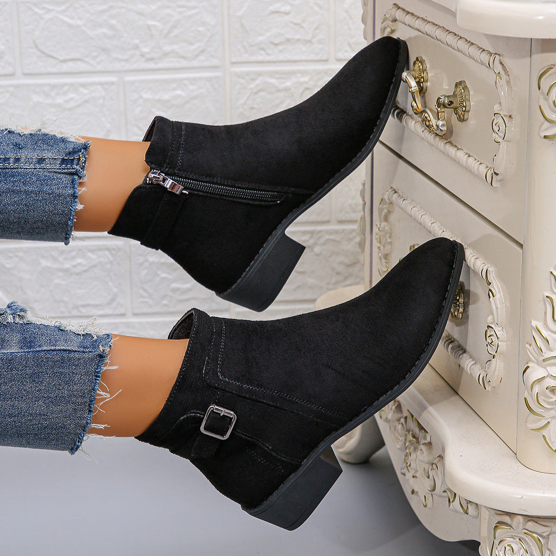 Marielle black ankle boots with buckle strap, raised view