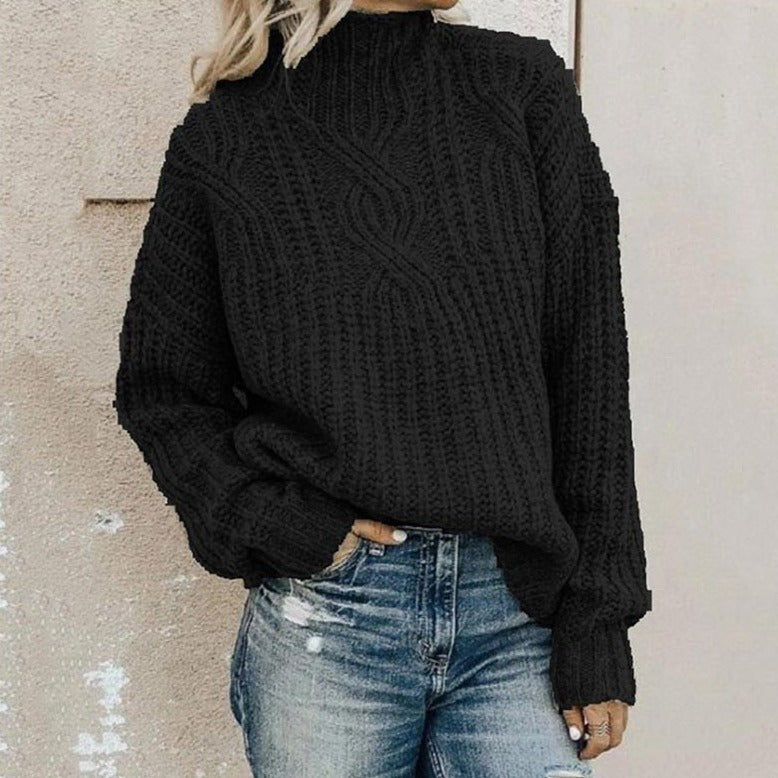 Annalise cable knit mock neck sweater in black, front view