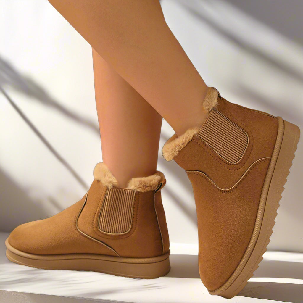 Odessa Chelsea boots in camel, side profile on model