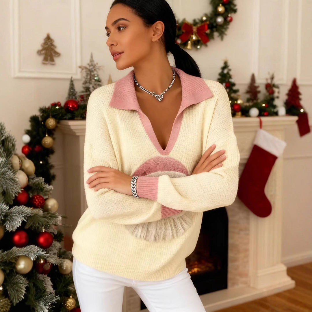 Noelani Santa print sweater styled by a fireplace with holiday decor