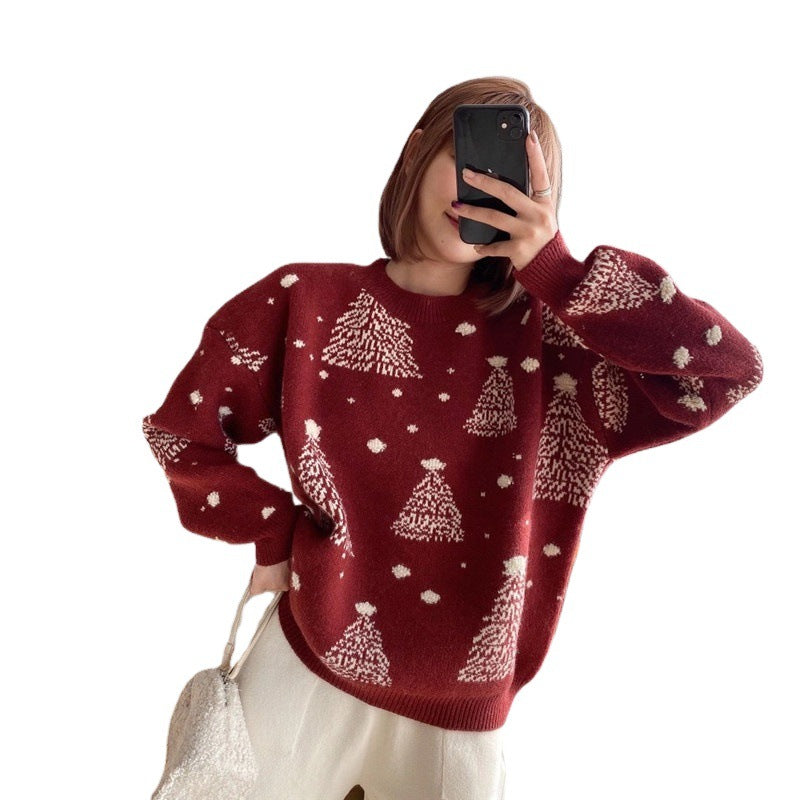 Rosamund Christmas tree print sweater in green, front view