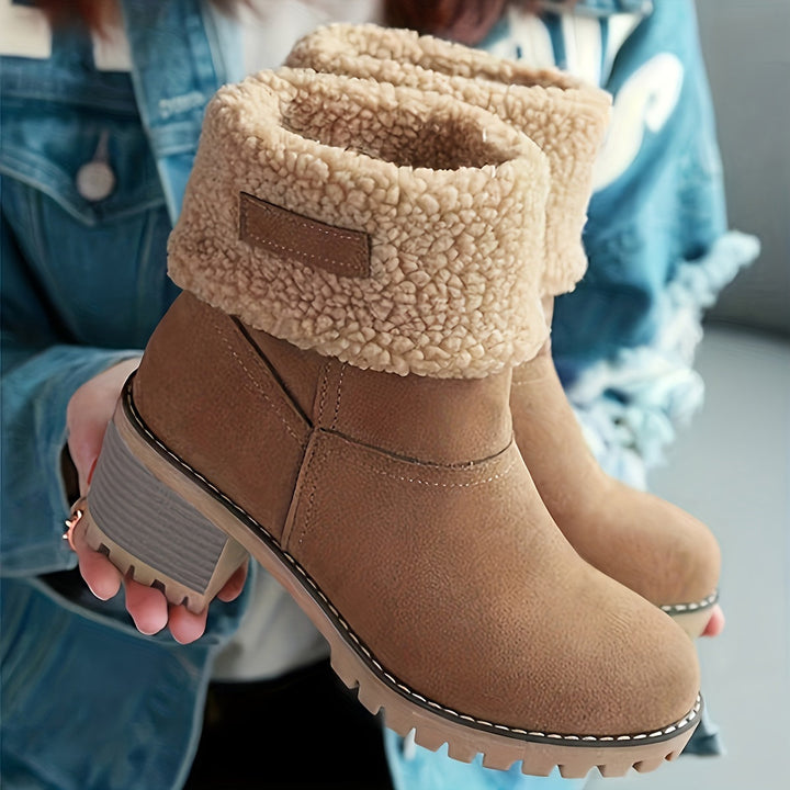 Thea cuffed block heel boots held in hand, close-up detail