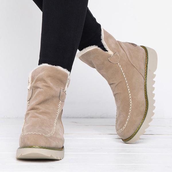 Priscilla beige snow boots worn on feet, walking view