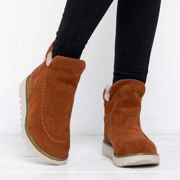 Priscilla camel brown snow boots worn on feet, rear view