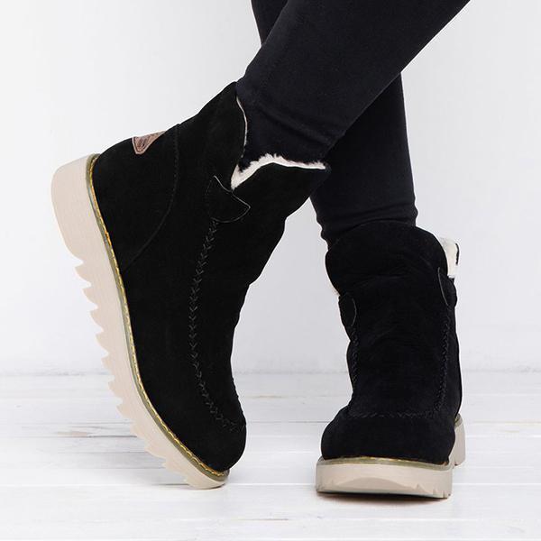 Priscilla camel brown snow boots worn on feet, rear view