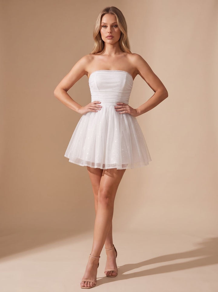 Vivienne glitter pleated bustier mini dress, back view with bow detail