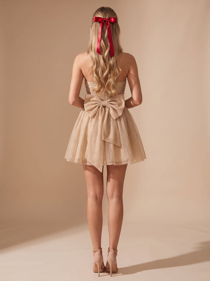 Vivienne glitter pleated bustier mini dress, back view with bow detail