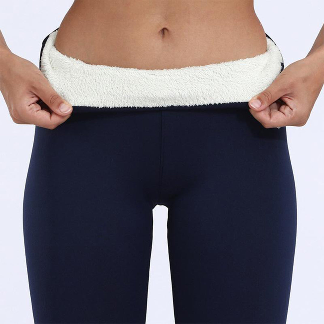 Close-up of Noelle leggings' fleece lined ankle cuffs on both legs