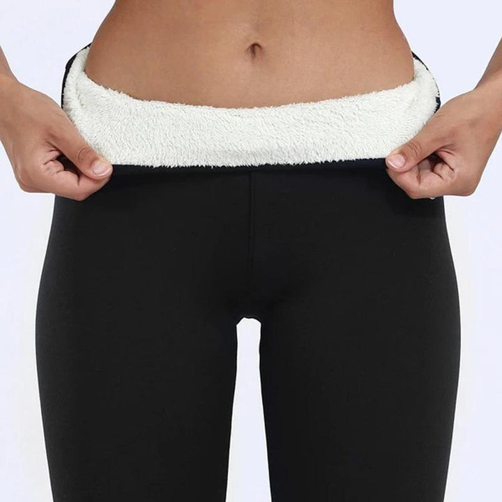 Close-up of Noelle leggings' fleece lined ankle cuffs on both legs